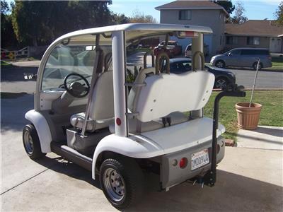 some additions 2002 Ford Think 4 Seater Golf Cart