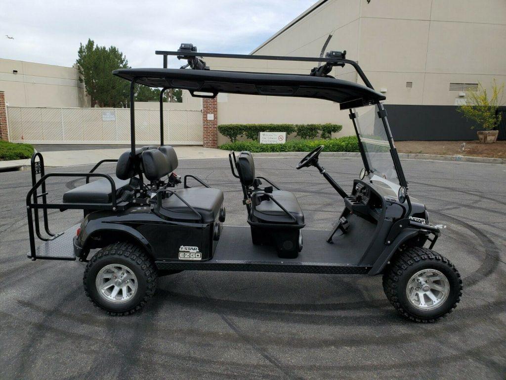 lifted 2012 EZGO Express golf cart